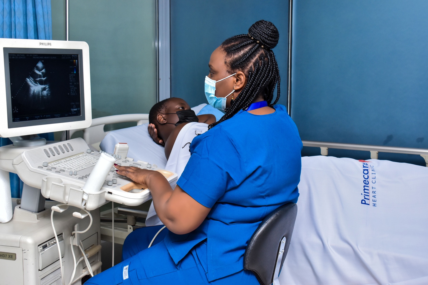 Cardiologist performing an echocardiogram at Primecare Heart Clinic